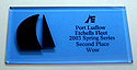 Blue acrylic sailing trophy with black sails, black lettering